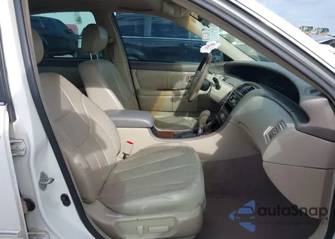 2003 Toyota Avalon Xls z USA, uszkodzony, nr VIN 4T1BF28B23U310670